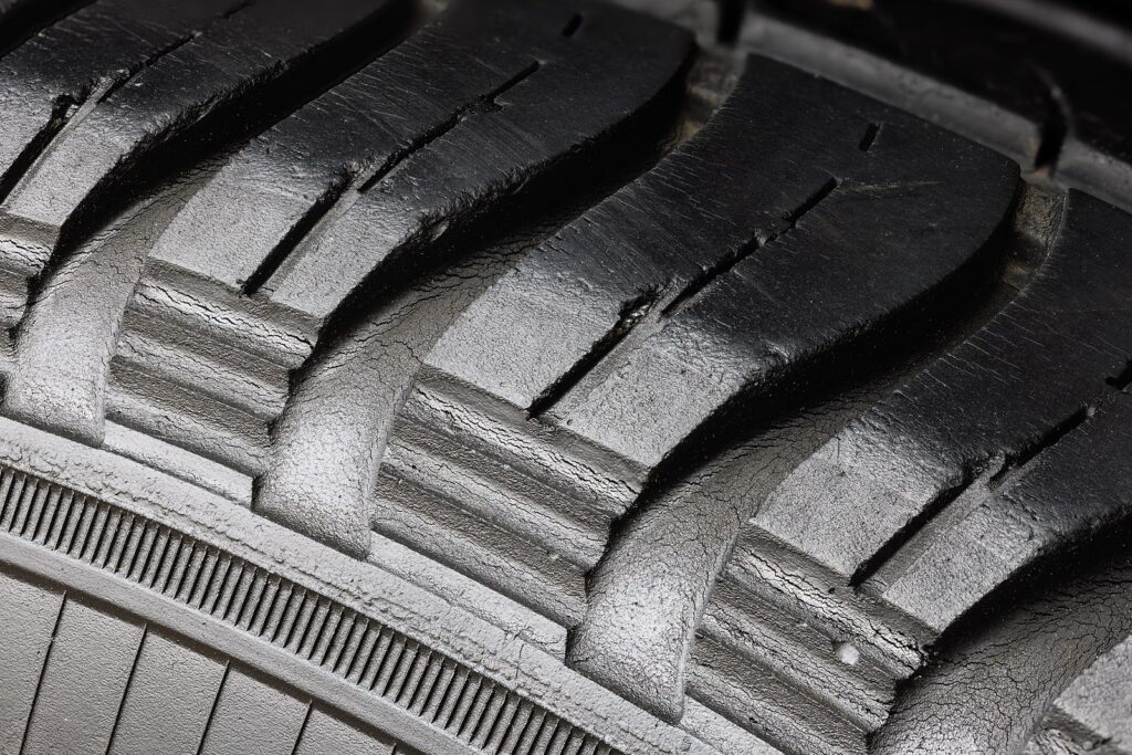 Up close image of a cracked tire